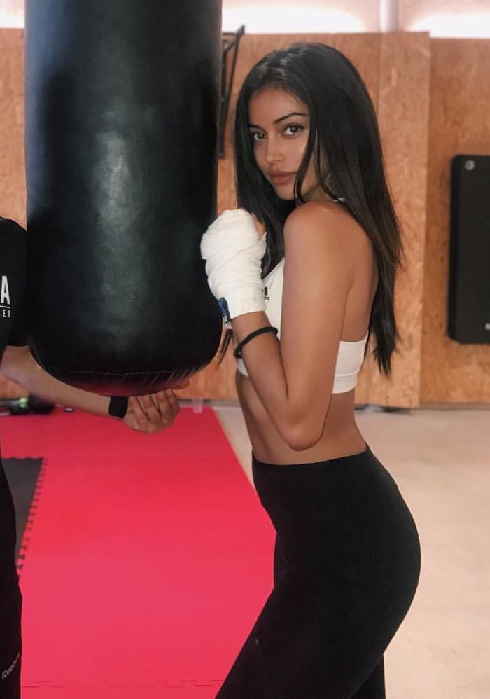 Cindy Kimberly practicing on a boxing bag